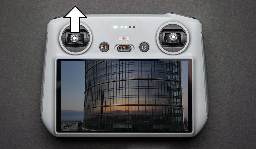24 Drone Moves for Cinematic B-Roll A Picture of DJI RC Controller