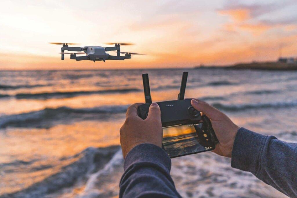 A Picture of a person flying drone
